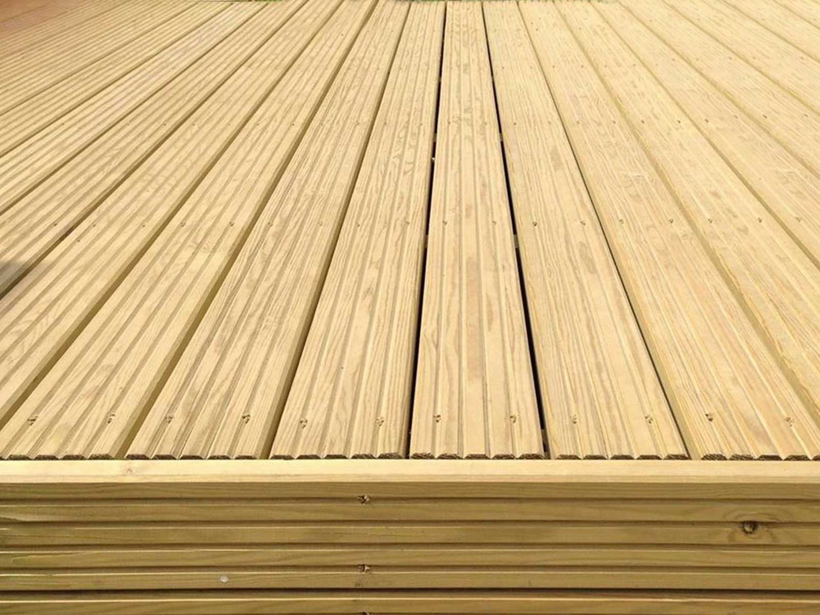 Pressure-treated softwood decking boards